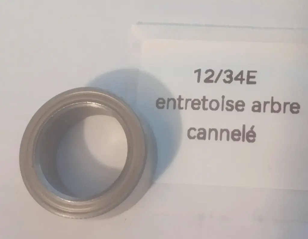 [12/04E] 12/34E Entretoise arbre cannelé